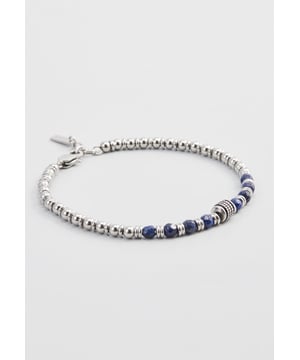 20 cm lange roestvrijstalen armband met lapis lazuli-stenen en stalen stoppers. Gepersonaliseerd label met logo.