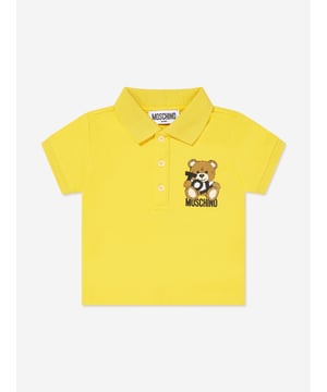 Moschino incorporate unique energy and a wistful elegance into their Italian designs. This baby boys yellow polo shirt is woven in beautiful high quality. Engineered in cotton pique with a pointed collar and a front button fastening. It is embellished with the iconic teddy bear, toy writing, and bold logo.

Ribbed Short Sleeves
95% Cotton, 5% Elastane