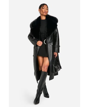 Luxurious faux fur collar for added warmth and style
        Double-breasted design with button fastening
        Belted waist for a flattering silhouette
        Long sleeves with adjustable cuff straps
        Full-length cut for maximum impact
    
    Make a bold statement on your next night out with this show-stopping trench coat. The dramatic faux fur collar adds a touch of glamour, while the sleek silhouette ensures you'll turn heads wherever you go. Perfect for those chilly evenings, this coat can be styled with a little black dress and knee-high boots for a classic look that oozes confidence. Alternatively, pair it with skinny trousers and stilettos for a more contemporary edge. The versatile design means it's equally at home for a sophisticated dinner date or a lively night at the club. With its ability to effortlessly elevate any outfit, this trench coat is sure to become your go-to piece for making an entrance at any social gathering.