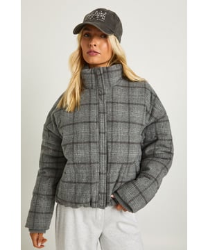 Stylish check pattern puffer jacket with a contemporary boxy fit
        High neck design for extra warmth and protection against the elements
        Quilted padding provides exceptional insulation without excessive bulk
        Front zip fastening for easy wear and versatile styling options
        Cropped length perfect for pairing with high-waisted bottoms
    
    This on-trend check puffer jacket combines fashion-forward design with practical warmth for the cooler months. The boxy silhouette creates a relaxed, contemporary look that's right on the pulse of current trends. Style with wide-leg joggers and trainers for an effortlessly cool weekend ensemble, or pair with your favourite jeans and boots for casual outings. The cropped length works brilliantly with high-waisted trousers or skirts, making it a versatile addition to your casual wardrobe. Perfect for family gatherings, coffee dates or weekend shopping trips, this Boohoo jacket offers the ideal balance of comfort and style. Add a baseball cap and crossbody bag to complete the look, just as shown. The timeless check pattern ensures this piece will remain a staple in your collection for seasons to come.