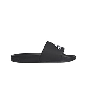 
Adidas Adilette Shower Badslippers - Perfect voor elke gelegenheid

 Maak kennis met de Adidas Adilette Shower badslippers, de ultieme keuze voor comfort en stijl tijdens warme dagen. Deze fijne slippers zijn vervaardigd uit hoogwaardig foam, wat zorgt voor een heerlijke demping en ondersteuning, of je nu aan het zwembad ligt of na het sporten even wilt relaxen. Het strakke zwarte design past prachtig bij elke outfit, waardoor ze ideaal zijn voor dames, heren, jongens en meisjes. De veelzijdigheid van deze slippers maakt ze tot een must-have in jouw zomercollectie.

 Waarom zijn badslippers essentieel voor jouw garderobe?

 Veel mensen vragen zich af waarom badslippers onmisbaar zijn. Ze zijn niet alleen perfect voor het strand of het zwembad, maar ook voor thuis na het douchen of sporten. De Adidas Adilette Shower badslippers zijn speciaal ontworpen om je voeten de hele dag door comfortabel te houden, met een ademend ontwerp dat zweet en