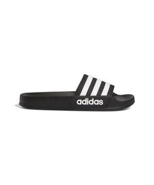 
ADIDAS ADILETTE SHOWER K (G27625)
Verwen jonge voeten met deze comfortabele ki nderslippers als ze uit het zwembad komen. Ze zijn sneldrogend en ultrazacht, en  verzorgen voeten in de groei met lichtgewicht demping. De klassieke look komt v an de grote, opvallende adidas logo's.

- **Merk:** ADIDAS
- **Artikelnummer:**  G27625
- **Pasvorm:** REGULAR
- **Productgroep:** SANDALS/SLIPPERS
- **Geslacht: ** DAMES/HEREN
- **Leeftijdsgroep:** KIDS