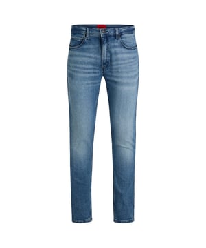Zip fly and button fastening.Five-pocket design.Mid rise.Slim fit.