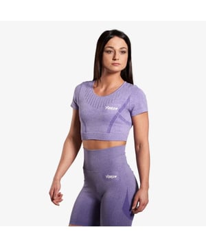 
<!DOCTYPE html> <html lang="nl"> <head>     <meta charset="UTF-8">     <meta name="viewport" content="width=device-width, initial-scale=1.0">     <meta name="description" content="Ontdek de Forza Naadloze Crop Top, de perfecte top voor comfortabele workouts. Het korte model en het ademende stretch materiaal maken dit een ideale keuze. Bestel nu op SportenSki.nl.">     <meta name="keywords" content="Forza Crop Top, Naadloze top, workouts, stretch materiaal, ademend, comfortabel, high waist legging, Grape Purple, producteigenschappen, materiaal">     <title>Forza Naadloze Crop Top - SportenSki.nl</title> </head> <body>     <h1>Forza Naadloze Crop Top</h1>     <p>De Forza Naadloze Crop Top is de perfecte keuze voor comfortabele workouts. Het korte model in combinatie met het fijne stretch materiaal in de taille maakt deze Crop Top uiterst comfortabel. De elastische band zorgt voor een perfecte pasvorm rond de middel.</p>     <p>Het ademende materiaal voorkomt transpiratie en zorgt ervoor dat je op het hoogste niveau kunt presteren. De naadloze Crop Top heeft prachtig gedetailleerde contouren en biedt ondersteuning rondom de buste en ribben. De hals en nek zijn voorzien van ventilerende mesh voor extra koeling. Deze Crop Top is volledig naadloos en voorkomt irritaties van naden en stiksels. De verlengde mouwen zijn uitgerust met duimgaten, waardoor je de Crop Top ook tijdens koudere perioden kunt dragen.</p>     <p>Maak je outfit compleet met een bijpassende high waist legging voor een stijlvolle look.</p>     <h2>Producteigenschappen:</h2>     <ul>         <li>Naadloos ontwerp</li>         <li>Crop Top (kort model)</li>         <li>Verlengde mouwen met duimgaten</li>         <li>Gedetailleerde contouren</li>         <li>Stretch materiaal</li>         <li>Ademend en ventilerend</li>         <li>Ventilerende mesh</li>         <li>Forza logo</li>         <li>Kleur: Grape Purple</li>     </ul>     <h2>Materiaal:</h2>     <ul>         <li>65% Polyamide</li>         <li>27% Polyester</li>         <li>8% Spandex</li>     </ul>     <p>Bestel de Forza Naadloze Crop Top nu op SportenSki.nl voor ultiem comfort tijdens je workouts!</p> </body> </html>