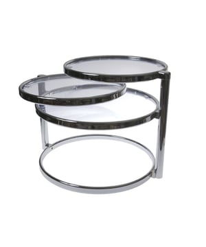 
Strak, modern en stijlvol; tafel Swivel Double van Leitmotiv maakt indruk met zijn bijzondere design met 3 tafelbladen waarbij je de bovenste 2 tafelbladen opzij kunt draaien. Ideaal wanneer je visite verwacht. Deze originele tafel van Leitmotiv kan gebruikt worden als salontafel of bijzettafel in de zithoek, maar ook in de slaapkamer kan Leitmotiv tafel Swivel worden ingezet. De combinatie van glas en chroom maken de tafel tijdloos en passend in elke interieurstijl. Een echte klassieker van Leitmotiv. - Afmeting: 1x58x43cm - Kleur: Zilver - Materiaal: Glas