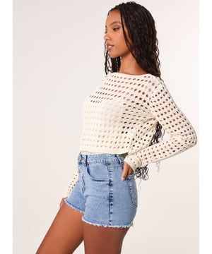 Solve all of those nothing to wear dilemmas wearing this Long Sleeve Crochet Top! An easy option to throw on and go or for your next holiday!