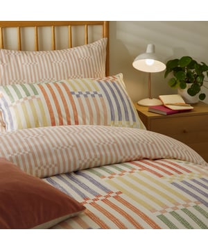 Transform your bedroom into a sanctuary of calm with the Madison Stripe Abstract Duvet Cover Set. Featuring reversible designs that blend playful patterns with elegant stripes, this duvet cover adds a subtle touch of nostalgia through beautifully curated hues and tones. The ultra-soft fabric is not only easy to care for but also delivers the perfect balance of comfort and style, ensuring it feels as good as it looks. Ideal for those who value inviting aesthetics and effortless upkeep, this duvet set offers a versatile design to create a space where happiness and relaxation come naturally.