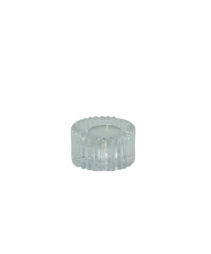 
LIGHT IT UP - A dinner table without candles is a no go. This glass candle holder fits any table and interior. It is made of glass with a beautiful relief. One side of the candle holder is suitable for a dinner candle and the other side fits a tealight/ With this candle holder you will create an instant cozy ambiance with the candle you prefer!  Important features:- Made of glass- Colour: Clear glass- Suitable for a dinnercandle and a tealight- Size: 8x4 cm Styling Advice: Place a set of 2 candle holders or combine several candle holders in a group on the table. Merk: Candle/Tealightholder - Glass - Clear - 8x4cm