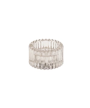 
LIGHT IT UP - A dinner table without candles is a no go. This glass candle holder fits any table and interior. It is made of glass with a beautiful relief. One side of the candle holder is suitable for a dinner candle and the other side fits a tealight/ With this candle holder you will create an instant cozy ambiance with the candle you prefer!  Important features:- Made of glass- Colour: Grey- Suitable for a dinnercandle and a tealight- Size: 8x4cm Styling Advice: Place a set of 2 candle holders or combine several candle holders in a group on the table. Merk: Candle/Tealightholder - Glass - Smokey - 8x4cm