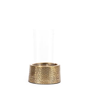 
This stylish candle holder in brass with a glass shaft adds an element of fun and design to your coffee table, fireplace or even your bathroom. This croco printed deco piece is crafted with attention to detail and can hold a medium sized candle. Croco print is always on-trend! Available in two sizes. KleurMessingHoogte (cm)22Breedte (cm)14Lengte (cm)14MaterialenAluminium, Glas Materiaal: