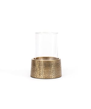 
This stylish candle holder in brass with a glass shaft adds an element of fun and design to your coffee table, fireplace or even your bathroom. This croco printed deco piece is crafted with attention to detail and can hold a medium to large sized candle. Croco print is always on-trend! Available in two sizes. KleurMessingHoogte (cm)24Breedte (cm)17Lengte (cm)17MaterialenAluminium, Glas Materiaal: