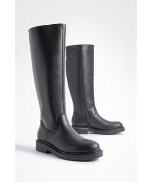 You can't go wrong with this pair of knee high boots for cold weather outfits. Designed to rise to the knee or slightly under, knee high boots are tighter around the ankle and calf and generally looser at the top for a comfortable fit. This season, our favourite knee boots are upgraded with stylish details, including lace-up closures, sky high block heels and party-ready leather finishes. A 1970s trend, knee boots are worn well with knitted dresses and jeans.Style: Over The Knee BootsFabric: PU