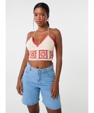 Introducing this new crochet bralette, the perfect addition to your spring/summer wardrobe! Pair with jorts for a stylish look.