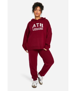 Cosy and comfortable co-ord set
        Oversized hoodie with 'ATH LEISURE' graphic
        Relaxed-fit joggers for ultimate comfort
        Ribbed cuffs and hem for a snug fit
        Versatile two-piece ensemble for effortless style
    
    Embrace laid-back chic with this Plus Ath Trainingsanzug from Boohoo. Perfect for those who prioritise comfort without compromising on style, this co-ord set is your go-to for casual outings and relaxed weekends. The oversized hoodie, adorned with a bold 'ATH LEISURE' graphic, pairs seamlessly with the matching joggers, creating a cohesive look that's both trendy and practical. Style it with white trainers and a roomy tote bag for a quick coffee run or weekend errands. For a more put-together appearance, layer the hoodie over a simple vest top and swap the joggers for your favourite denim. This versatile set transitions effortlessly from lounging at home to casual meet-ups with friends, embodying the essence of modern, fuss-free fashion.