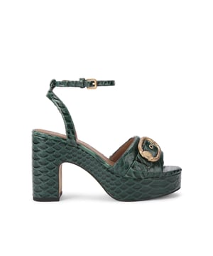 This Kurt Geiger Greenwich Platform Sandal is crafted from a dark green 3D embossed leather. There is a statement brushed gold oval trim with eagle head on the strap across the toe. Heel height: 10cm. Platform height: 3cm.
