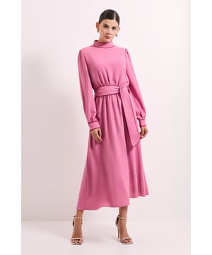 Elegant high neck design with contrasting piping detail for a refined finish
        Flattering midi length with flowing silhouette that gracefully skims the figure
        Sophisticated tie waist belt that cinches and defines your waistline
        Long sleeves with subtle volume for a contemporary touch
        Versatile woven fabric that drapes beautifully for all-day comfort
    
    This Principles midi dress combines timeless elegance with modern detailing. The high neckline with contrasting piping creates a sophisticated focal point, while the tie waist adds definition and allows for a customised fit. The flowing midi length offers versatility for various daytime occasions, from family gatherings to weekend brunches. Style with white trainers and a crossbody bag for a casual coffee date, or dress it up with block-heeled ankle boots and a structured blazer for lunch with friends. The long sleeves make this piece perfect for transitional weather, while the graceful silhouette ensures you'll feel confident and comfortable throughout the day. This dress works beautifully with minimal jewellery - try delicate stud earrings and a simple bracelet to complete your look without overwhelming the dress's refined details.