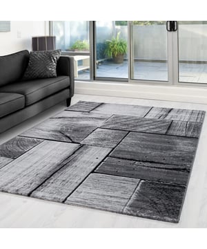 
Prachtig design vloerkleed uit de Parma Collectie. - 80x150 CM Prachtig design vloerkleed uit de Parma Collectie. Dit vloerkleed geeft een verfrissende look vanwege zijn moderne motief. Met een poolhoogte van 10mm is dit vloerkleed superwarm en geschikt voor vloerverwarming. De vlakken zijn ingeschoren en geven een mooi 3D effect. Dit vloerkleed is super vol geweven met 272.000 pooldraden/m². Dit vloerkleed is anti-statisch en anti-allergisch. Gemakkelijk in onderhoud en zeer gemakkelijk te stofzuigen. Dit model beschikt over meerdere contrasterende kleuren en geeft een mooie sfeer in elk interieur. Artikeldetails: 272.000 pooldraden/m² Gewicht 1,9 kg/m² Materiaal onderkant: Jute Materiaalsamenstelling 100% polypropyleen Frisee Poolhoogte 13 mm Productietechniek: Machinaal geweven Loopgeluiddempend Merk: Muratap Materiaal: Polypropyleen Kleur: Zwart Afmetingen: 80x150 CM EAN: 7444708016001