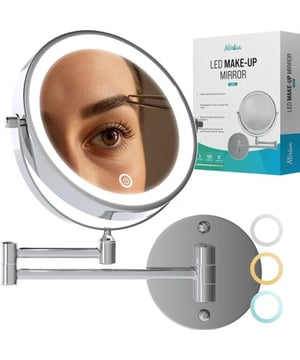 
Transform Your Beauty Routine with Precision and Style Meet the ultimate beauty essential: a rechargeable LED make-up mirror with 5x magnification. Whether you're applying flawless makeup, grooming your brows, or inserting contact lenses, this mirror helps you see every detail with clarity. Designed for both elegance and functionality, it's perfect for your bathroom, vanity table, or travel kit.  Lighting That Adapts to You With just a touch, switch between warm, neutral, or cool white light to match any setting from early mornings to evening touch-ups. The dimmable LED lighting ensures you always have the perfect brightness, no matter the time of day.  Flexible Design That Moves with You Get the perfect angle every time with a fully adjustable, space-saving design: Double-sided mirror with 1x and 5x magnification 360° rotation – both horizontally and vertically Extendable arm (up to 29 cm) for precise positioning Auto shut-off after 30 minutes to save energy  Why Choose This Make-Up Mirror? Customizable Lighting – 3 light modes with touch dimming 5x Magnification – Perfect for detail work Rechargeable – No batteries needed Elegant Chrome Finish – Durable and stylish Compact & Functional – Ideal for daily use or on the go  Effortless to Use No complicated setup. Simply mount, plug in the included USB charging cable, and enjoy professional lighting and visibility every day.  Built to Last Crafted from silver-plated glass and stainless steel, this mirror combines premium materials with long-lasting performance. With 27 bright white LEDs, it’s built for precision and durability.  Our Promise to You We back our mirror with full confidence: 24-month warranty 30-day return policy Responsive customer support  Ready to See Yourself in a Better Light? Upgrade your beauty routine today. Order your LED make-up mirror and enjoy flawless results with every look.