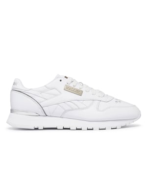 Leather upper.Lace up fastening.Low top.Round toe  closed toe  logo embellished  lined  tonal stitching.Rubber sole.