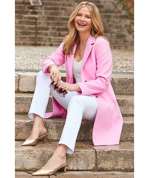 It's pastel seasonCut for a sleek, tailored silhouette Cinched at the waist with a double-button fasteningClassic collared neckline Thigh-skimming hemline to keep you cosy It'll take you from work to weekend