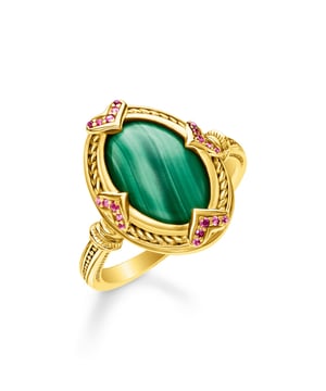 Thomas Sabo Stone Ring. An Exclusive Cocktail ring with oval precious stone. Malachite with shiny cabochon cut. Frame with undulating structure and pavé stone hearts. Rounded, pleasant to wear ring rail inside. Symbolism: In the healing arts, malachite promotes the connection between people. Each piece of jewellery a unique item. Designed with attention to detail, created by precise craftsmanship. Material: 100% 18K Gold Plated Sterling Silver (Recycled). Ref: TR23039677.