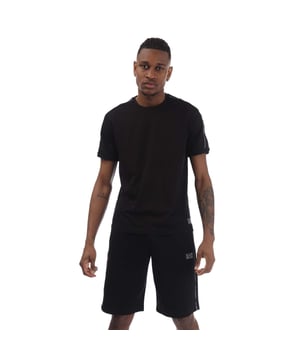 Men's Emporio Armani EA7 Logo Series Cotton-Jersey T-Shirt.- Crew neck.- Short sleeves.- Rubber EA7 Emporio Armani logo patch above the left side hem.- Shoulders tape detail which include EA7 Emporio Armani logo woven in black on the left sleeve.- Regular fit.- Material: 79% Polyester, 12% Polyamide, 9% Elastane. Ref: 7M000138UC0001.