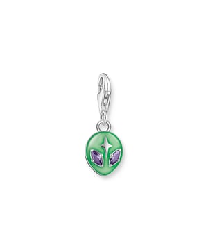 Thomas Sabo buitenaardse charme hanger. Bedel gemaakt van 925 Sterling zilver in de vorm van een buitenaards hoofd. Versierd met groen koud email dat schittert in het donker, evenals ogen gemaakt van witte zirkonia stenen. Individuele combinaties door de bedel aan Charm Club armbanden en kettingen te haken dankzij de karabijnhaak. Buitenaardse bedel: de hanger met zijn karabijnhaak is gemaakt van hoogwaardig 925 sterling zilver in de vorm van een driedimensionaal buitenaards hoofd. De ogen worden geaccentueerd door witte zirkonia stenen met een markiezin-slijpvorm. Een verhoogde steen verfraait het voorhoofd van de alien. Bijzonder hoogtepunt: het handgeschilderde groene koude email schittert in het donker. De ster en de stenen ogen sieren ook de achterkant van de bedelhanger. Dankzij de karabijnhaak kan deze bedel aan Charm Club kettingen en armbanden worden gehaakt en ook worden gecombineerd met andere bedels. Deze buitenaardse bedel is een uitstekend cadeau-idee voor dierbaren. Materiaal: 100% Sterling Zilver. Ref: 20500416.