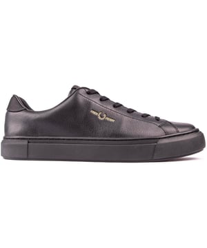 The Fred Perry B71 Cupsole sneaker is a stylish and comfortable court trainer in a mono design. Perfect for everyday wear, the leather sneaker features a soft black leather upper with a golden signature branding and a stylish, versatile look.