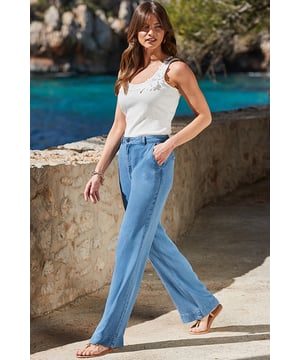 The jeans you’ve been searching forSpun from soft denim for a drapey silhouetteYou'll love the comfy relaxed cutTrending wide legsWear-with-everything mid-blue washEffortlessly cool with a vest top and sandalsInside leg to fit: Short 29" | Regular 31" | Long 33"