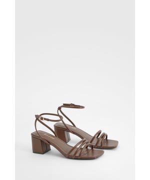 Look cute and feel comfy in these wide fit heels that will last you from boozy brunch all the way to bedtime, without the sore feet. They're designed to provide more room for the foot, and they have a wider tread on the sole, so they'll be super comfortable for you to make moves and serve looks, no matter what the occasion. You can wave goodbye to sore feet and say hello to a great night out. We're loving gold wide fit heels this party season teamed with a simple black midi - beaut.Style: 2 Part HeelsFabric: PU
