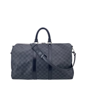 VINTAGE, RRP AS NEW
This beautiful Bag will come with a Certificate of ity provided by Entrupy. The certificate will be provided at no further cost  This Louis Vuitton 'Keepall Bandouliere 45' Travel Bag is a true icon of luxury and functionality, making it the ultimate companion for your next adventure. Crafted from the brand's signature Damier Graphite canvas, this timeless piece is accented with black leather trim, blending durability with high-end design. The bag opens to reveal a spacious black canvas lining, offering both style and practicality. Inside, you'll find a convenient side zip pocket and a D-ring, perfect for securing small essentials.  The double zip closure ensures easy access. Silver metal pieces and rounded leather handles elevate the bag's sophistication, while the adjustable and removable shoulder strap offers versatile carrying options, whether you prefer it on your arm or over your shoulder. A leather ID tag adds a personalized touch, and the "LOUIS VUITTON Paris - made in France" engraving on the leather trim at the bottom side confirms its ity. Inside, the data code (DU3173) is also engraved on the leather piece for provenance.  This stunning travel bag, with a retail price of €2,150, offers a perfect blend of luxury and practicality, making it a must-have for any Louis Vuitton enthusiast. Whether you're traveling the world or simply looking to elevate your everyday style, this bag promises to be both a functional and fashionable companion.    Condition Rating: A - EXCELLENTCondition Details: Gently used. Some normal wear of use. Padlock and keys are not included. Please check the photos carefully and ask if you need to know more details or if you have any doubts.Measurements (cm):Depth: 19.7Height: 26.7Length: 45.1Other Details: Dustbag? NoKeys? NoBox? No Measurments:  width: 197 mm length: 451 mm height: 267 mm strap length: 0 mm handle drop: 0 mm