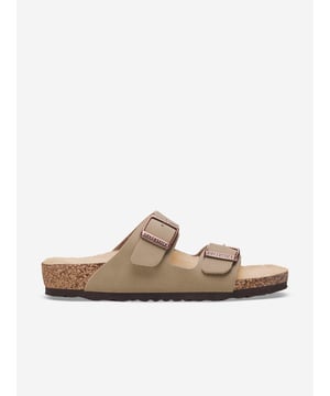 Introducing the exquisite Kids Arizona Shearling Sandals in Beige by Birkenstock, a timeless addition to your child's AW2024 wardrobe. Perfectly blending luxury with practicality, these sandals ensure your child steps into comfort with style:

Luxurious Shearling: Soft shearling lining keeps feet cosy and warm.

Iconic Design: Classic Birkenstock silhouette tailored for youthful elegance.

Versatile Beige: Neutral tone complements any outfit, enhancing wearability.

Revitalise your child's ensemble with these chic sandals. A delightful merge of sophistication and comfort awaits—order yours today!