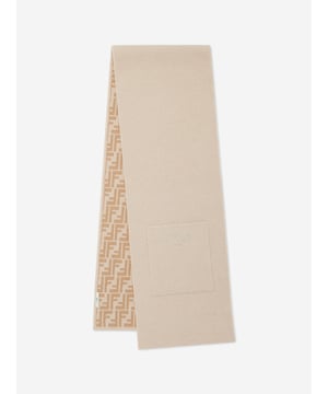 Introducing the sumptuous Kids Wool FF Reversible Scarf in Beige, meticulously fashioned by Fendi Kids in Italy a quintessential addition to any discerning young wardrobe for AW2024. Heres why its a must-have Impeccably Crafted in Italy Expertly produced with premium wool, ensuring both luxury and longevity. Reversible Design Offers versatile styling options with its delightful beige colour, doubling the chic. Iconic Branding Emblazoned with the subtle yet striking FF logo, it promises to infuse a dash of designer flair.Elevate your childs style quotient with this exquisite accessory. Secure yours today!