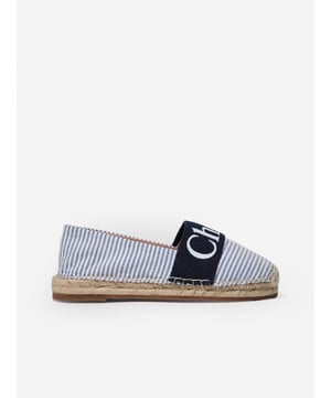 Chloé's Parisian aesthetic explores a modern Bohemian outlook. These girls blue and white espadrilles are reflective of the French luxury label's high quality construction and precision of beauty. Made in an immaculate textile design via sheep leather lining, rope soles, and a Chloé branded illustration on the top. She will be obsessed.

Mini Me
Mineral Tanning
Sold in a Chloe Shoe Box
100% Textile