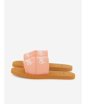 Chloé's Parisian aesthetic explores a modern Bohemian outlook. These girls raspberry sliders are reflective of the French luxury label's high quality construction and precision of beauty. Made in an immaculate textile design via EVA soles and a striking Chloé branded illustration on the top.

Mini Me
Textile Flip Flops
Sold in a Chloé Shoe Box
100% Textile