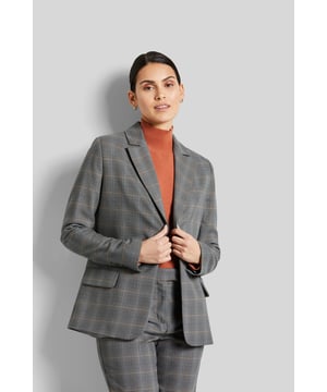 Dieser karierte 1-Knopf-Blazer ist aus einer elastischen Viskosequalität gefertigt und bietet damit ein hohes Maß an Tragekomfort. Mit diesem Kleidungsstück bringst Du Deinen Business-Look perfekt zum Ausdruck. Der Reverskragen und die Pattentaschen stehen im Mittelpunkt des klassischen Blazers.