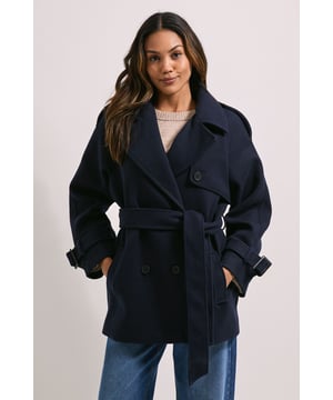 Double-breasted design with distinctive tab detailing for a contemporary twist
        Adjustable belted waist creates a flattering silhouette that can be cinched or worn relaxed
        Practical welt pockets perfect for keeping essentials close at hand
        Collared neckline with wide lapels for a classic outerwear aesthetic
        Versatile regular fit with turned-up cuffs for added style dimension
    
    This Dorothy Perkins Tab Detail Belted Coat offers the perfect balance of timeless design and modern styling. The relaxed regular fit allows for comfortable layering over jumpers and lightweight knits, making it ideal for transitional weather. Style with straight-leg jeans and white trainers for weekend brunches with friends, or pair with wide-leg trousers and ankle boots for baby showers and family gatherings. The versatile collared design works beautifully with both casual and smart-casual outfits, while the belted waist can be adjusted to create different looks depending on your mood. The woven fabric provides structure and warmth without bulk, making this coat a practical yet stylish choice for daywear throughout the cooler months. A true wardrobe staple that will complement your existing collection with effortless sophistication.