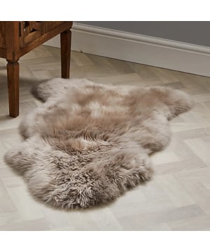 Crafted from 100% real sheepskin wool, it offers a silky, fluffy texture that adds instant warmth and elegance. Measuring approx. 90 x 60 cm, this premium hide is soft, breathable, and durable—perfect as a floor rug, sofa throw, chair cover, or bed accent.

Key Features

100% Genuine Sheepskin Wool – soft, silky, and naturally luxurious.

Size: 90 x 60 cm (approx.) – versatile for any room.

Natural & Breathable – warm in winter, cool in summer.

Plush, Fluffy Pile – adds comfort and timeless style.

Long-Lasting Quality – durable wool that keeps its beauty.

Perfect For

Living rooms, bedrooms, or nurseries.

Sofa, chair, or bed styling.

A thoughtful, luxury gift.

Why Sheepskin?
Unlike synthetics, real sheepskin offers natural softness, unique character, and everyday comfort with lasting durability.