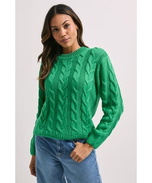 Classic cable knit design with intricate braided pattern throughout
        Comfortable crew neckline with ribbed trim for a neat finish
        Relaxed fit with full-length sleeves for everyday comfort
        Ribbed cuffs and hem create a structured silhouette
        Versatile knit that pairs effortlessly with jeans or trousers
    
    This Dorothy Perkins cable knit jumper combines timeless style with everyday comfort. The textured cable pattern adds visual interest and dimension to your casual wardrobe, while the classic crew neck ensures a flattering neckline. Style it as shown with wide-leg denim and trainers for weekend brunches with friends, or pair with tailored trousers and ankle boots for casual Friday at the office. The relaxed fit makes it perfect for layering over a collared shirt for a preppy look, or simply wear it on its own for a clean, unfussy aesthetic. Ideal for family gatherings, coffee dates, or casual shopping trips, this jumper offers the perfect balance of style and practicality for the woman who values both comfort and trend-conscious fashion.
