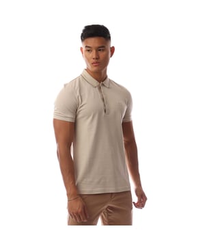Mens BOSS Paule 4 Cotton Piqué Slim Fit Polo Shirt with tonal logo in open beigeA cotton-piqué polo shirt by BOSS Menswear. Cut to a defined fit  this top features a tonal logo and stripe details.- Slim fit- Flat-knit collar- Number of buttons: 3- Short sleeves- Flat-knit cuffs- Standard length- 100% Cotton.  Machine washable.- Ref: 50506195-284