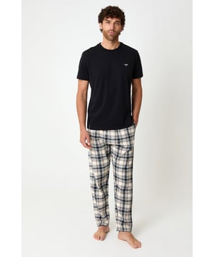 Upgrade your nightwear with this two piece check pyjama set from Threadbare. The set includes a cotton blend short sleeve t-shirt with chest embroidery and a ribbed crew neck, paired with brushed cotton check bottoms featuring an elasticated waistband, drawcords and side entry pockets.