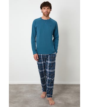 Lounge in comfort with this cotton rich pyjama set from Threadbare. This set contains a long sleeve top with raglan sleeves and Threadbare embroidery on the chest, and long flannel check pants with an elasticated waistband and branded drawcords. Perfect for lounging at home or bedtime.