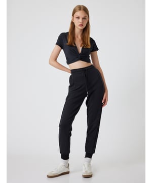 -Mit Nahtdetail -Relax -Jogger -Seitentasche -Krop Länge(Handgelenk) -Hohe Leibhöhe -Hosenbein Mit Gummizug -Sweathose