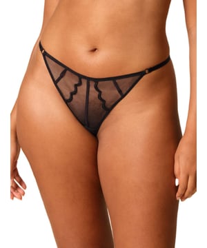 Gossard Obsession Thong. Mid rise string thong with a strap design, sheer mesh and a soft brushed mesh design. The product is recommended for gentle wash only.