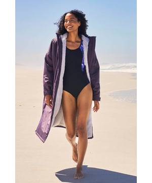 Our Tidal Womens Waterproof Changing Robe is made of 100% polyamide fabric that is waterproof and windproof with taped seams. It has a borg lining to help you keep warm and dry after swimming and an adjustable hood to protect you from the rain. With front pockets to carry the essentials and an easy central zip fastening, this changing robe would be ideal for before and after swimming. (Ref: 051500)