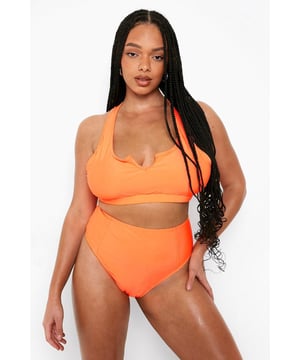 Notch neck design for a unique and flattering neckline
        Racerback style for enhanced support and freedom of movement
        High-waisted bottoms for a confident and comfortable fit
        Stretchy fabric blend for optimal comfort and shape retention
        Vibrant hue to make a bold statement at the beach or pool
    
    Make waves this season with our Plus Neon Essentials Notch Neck Bikini Top. This eye-catching two-piece is designed to turn heads and boost confidence. The notch neck detail adds a touch of sophistication to the classic bikini silhouette, while the racerback design ensures you stay comfortable and supported throughout your beach adventures. Pair with the matching high-waisted bottoms for a coordinated look that flatters your curves. Whether you're lounging by the pool, taking a dip in the sea, or enjoying a beachside cocktail, this swimwear set is versatile enough to see you through all your summer activities. Accessorise with oversized sunglasses and a wide-brimmed hat for the ultimate holiday ensemble. For those seeking a bit more coverage, throw on a sheer kaftan or loose linen shirt to transition effortlessly from beach to bar.