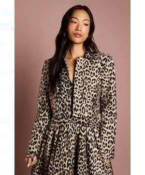Striking animal jacquard pattern creates a bold statement piece
        Cropped silhouette offers a contemporary twist on classic occasion wear
        Structured shoulders and tailored fit provide a sophisticated silhouette
        Front zip fastening for a sleek, modern finish
        Versatile design that can be styled as a complete outfit or statement separate
    
    Make an unforgettable entrance at your next special occasion with this exquisitely crafted animal jacquard cropped jacket from Coast. The distinctive pattern commands attention whilst the cropped length creates a flattering silhouette that works beautifully with high-waisted skirts or trousers. For formal events such as weddings or race days, pair with the matching full skirt as shown for a coordinated ensemble that radiates elegance. Alternatively, style with tailored black trousers and delicate jewellery for a sophisticated evening look. The structured design and impeccable attention to detail reflect Coast's commitment to creating occasion wear that feels both timeless and contemporary. This versatile piece transitions effortlessly from day to evening events, ensuring you look polished and refined for any celebration.