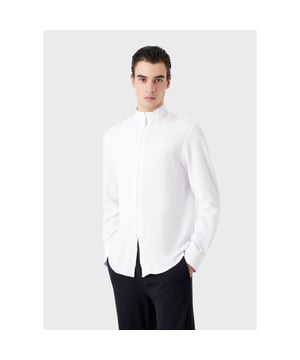 Stand-up collar.Long sleeves.Full zip fastening.Curved hem.