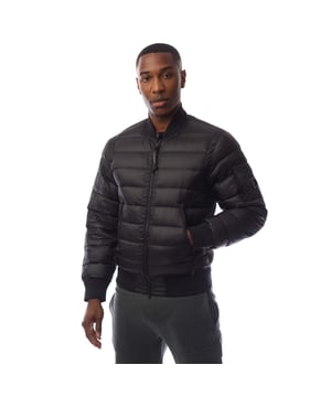 Mens C.P. Company D.D. Shell Down Jacket in black.- Ribbed collar with button placket.- Two-way full zip fastening.- Side zip pockets.- Ribbed cuffs and hem.- Lens detail.- Regular fit.- 100% Polyamide.- Ref: 19CMOW001A999