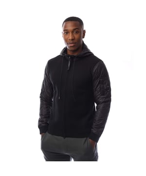 Mens C.P. Company Extrafine Merino Wool Mixed Hoodie in black.- Adjustable hood in D.D. Shell quilted with Primaloft® Silver.- Two-way full zip fastening.- Ribbed cuffs.- Sleeves in D.D. Shell quilted with Primaloft® Silver.- Lens detail.- Regular fit.- 100% Wool.- Ref: 19CMKN062A999